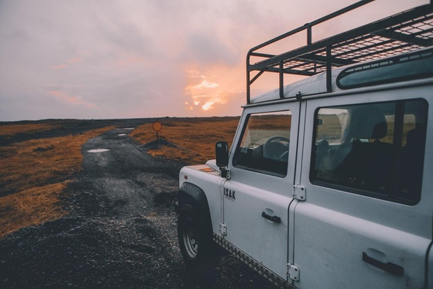 A Jeep which RED Shield Administration can cover drives across a rough country road