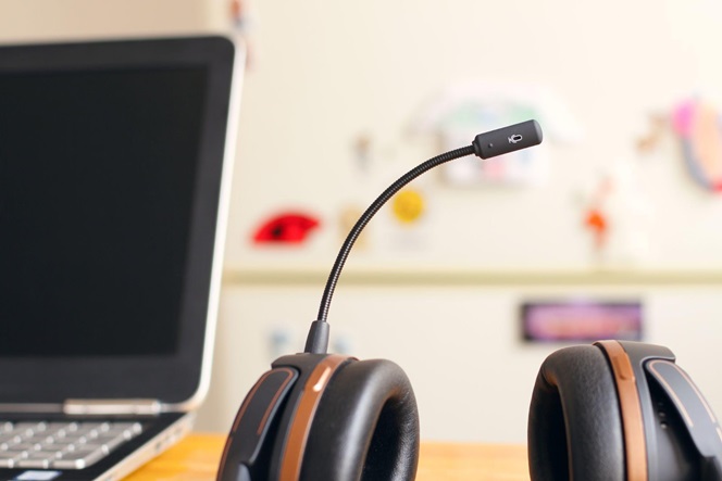 A headset that Veritas Global Protection representatives may use sits on a person’s desk